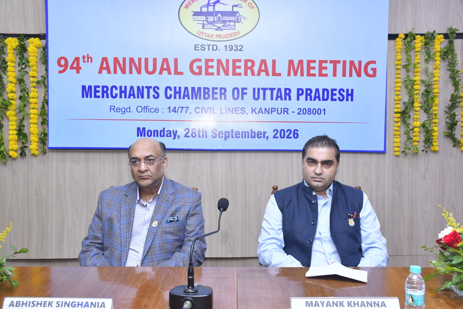 Shri Abhishek Singhania and Shri Mayank Khanna on the dais at the 94th Annual General Meeting