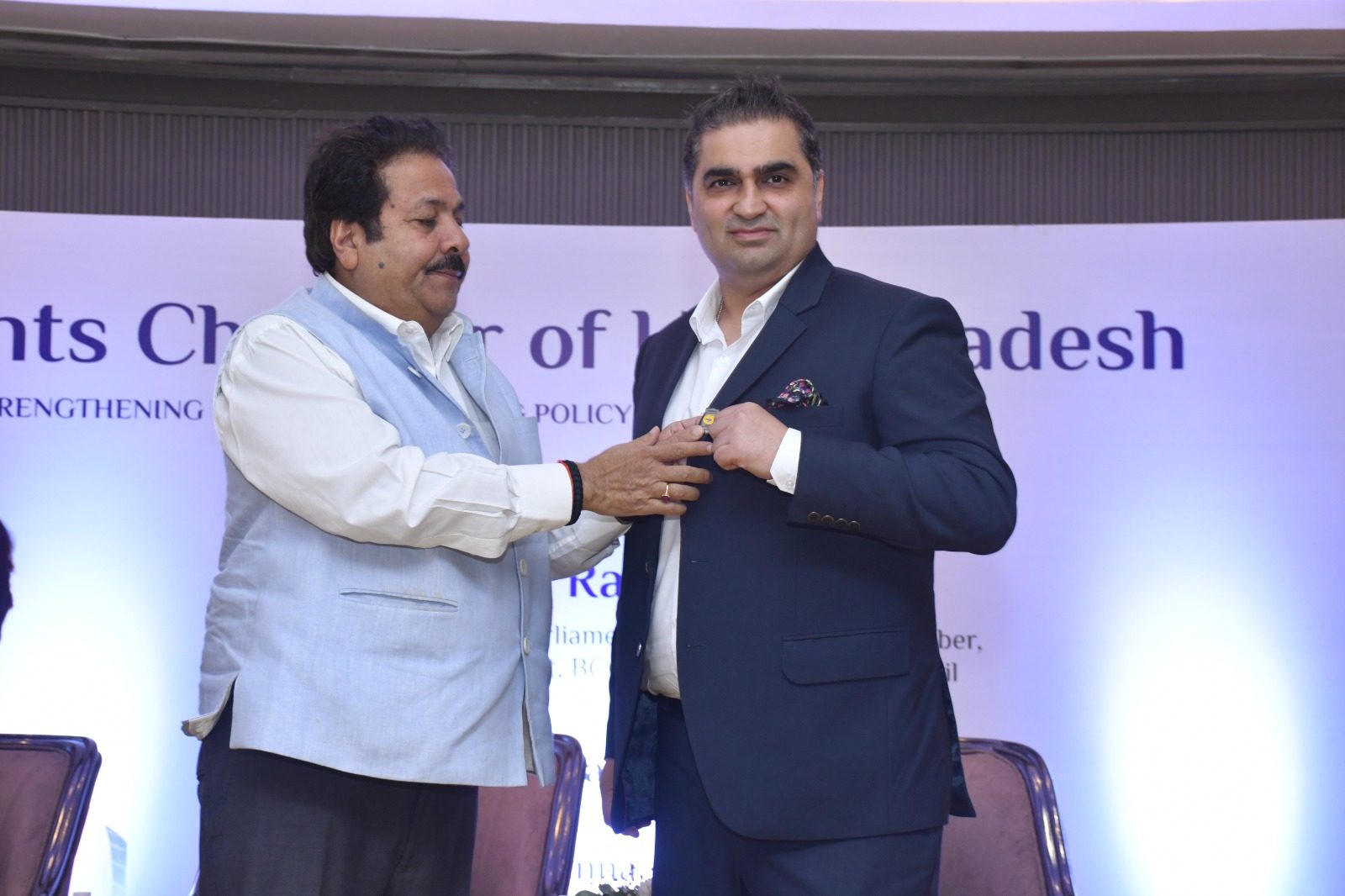 The presidential badge is pinned on at the installation ceremony, Status Club, Kanpur